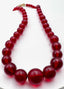 19" Graduated Russian Red Amber Necklace with a Vermeil Diamond Clasp