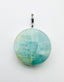 Faceted Round Aquamarine Pendant on Sterling Silver Diamond Bail