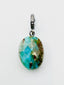 Faceted Oval Shaped Peruvian Opal Pendant on Sterling Silver Diamond Bail