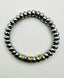 Pyrite Rondelle with Triple Gold Diamond Rondelle Stretch Bracelet