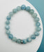 Faceted 8mm Aquamarine Ball Stretch Bracelet with a Bright Sterling Silver Diamond Rondelle