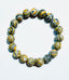 Yellow Lighting Fordite Bracelet with Diamond Rondelle, 7.25"