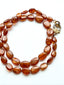 17.5" AAA Smooth Oval Hessonite Garnet Necklace with Two Tone Diamond Clasp
