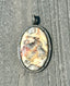 Crazy Lace Agate and Diamond with Sterling Silver Pendant, .59 Cts