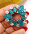 Vintage Rhinestone Clear and Green Glass Cabachon Prong Set Brooch from the 1950s