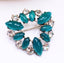 Vintage Rhinestone Clear and Green Glass Cabachon Prong Set Brooch from the 1950s