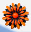 1970's Enamel Orange and Black Flower Brooch